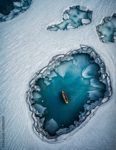 boat is seen from above, floating in the center of a frozen lake. The lake is full of cracks and the boat is a small red boat. The frozen lake is surrounded by more ice.