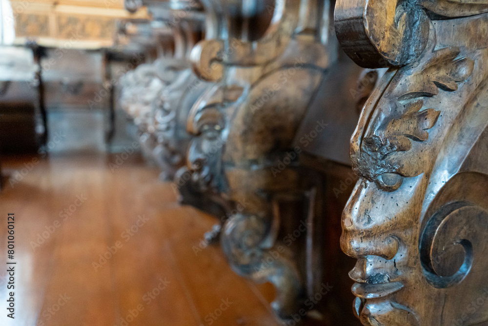 Chapel benches with faces carved in wood. Corpus Christi Convent, Vila Nova de Gaia, Portugal. Chapel benches with faces carved in wood. Corpus Christi Convent, Vila Nova de Gaia, Portugal.