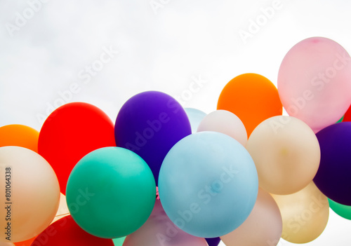 Colorful balloons on sky background. Birthday party, celebration concept copy space