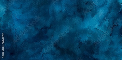 Textured blue surface with shades and cracks, an abstract art piece or a natural pattern