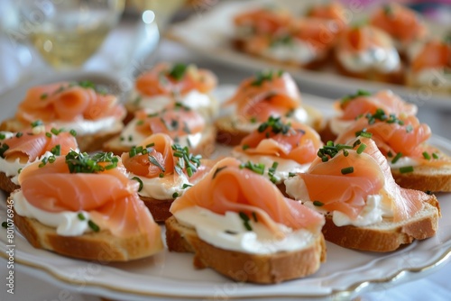 A tray of smoked salmon canapes, garnished with herbs, ready for a gourmet event or catering service showcase.