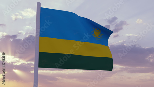Flag of Rwanda in the wind on a sunset sky photo