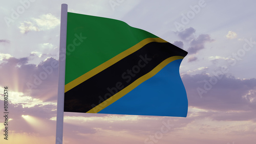 Flag of Tanzania in the wind on a sunset sky photo