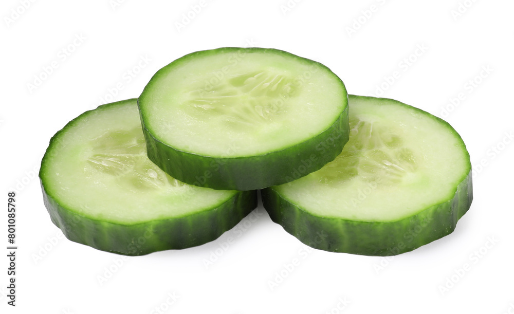 Slices of fresh cucumber isolated on white Slices of fresh cucumber isolated on white