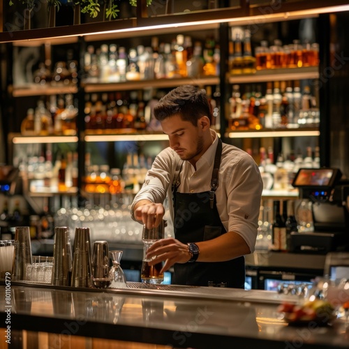 man in a bar pours drinks