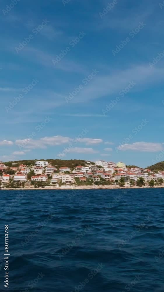View from board a yacht on the coast of one of the picturesque islands of Croatia. Vertical Video View from board a yacht on the coast of one of the picturesque islands of Croatia. Vertical Video