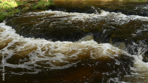 The sound of water on rocky waterfalls on the Tanew River in autumn.
