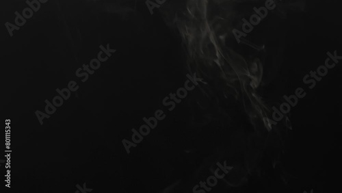 rising smoke on black background, swirling smoke on black backdrop, smoke on black background photo