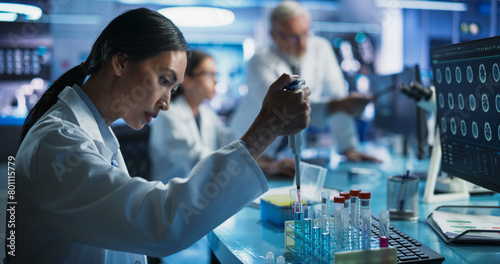 Bild auf Leinwand Pharmaceutical Research Laboratory: Female Asian Doctor Working With Test Tubes To Study Innovative Mental Disorder Medicine
