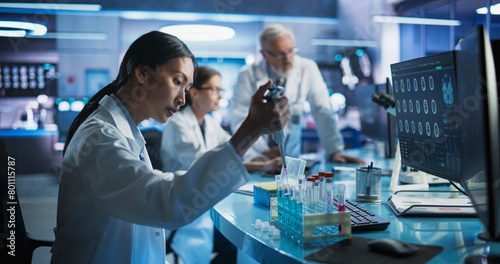 Fotografie Pharmaceutical Research Laboratory: Female Asian Doctor Working With Test Tubes To Study Innovative Mental Disorder Medicine