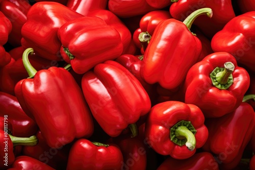 Red bell peppers on a market stall, close-up of photo