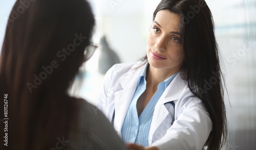 Adult caucasian doctor is sympathetic to patient. Psychological support for seriously ill people concept
