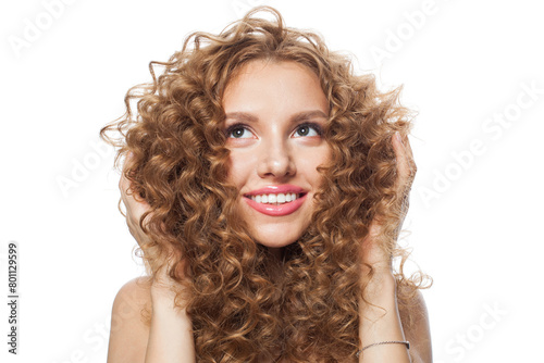 Fashionable woman face. Young model with healthy skin, long hair and makeup on white background