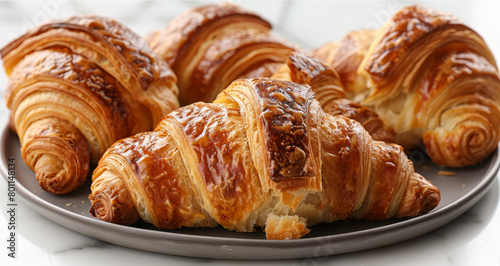  croissants in foreground  more in background