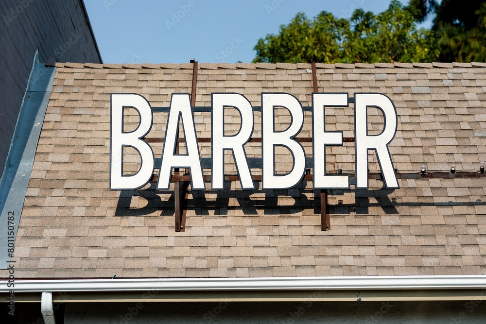 Obraz premium Barber shop sign on roof, business identity branding