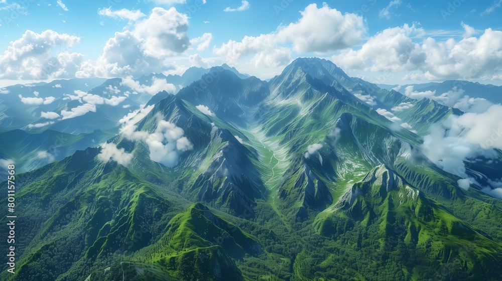 Mountains, clouds and tops of trees in from a bird's eye view. Dense forest and mountainous terrain at dawn from a bird's-eye view. Sunlight illuminates the area.