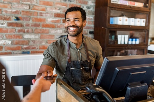 Receptionist taking payment for the customers