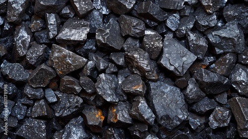 A close up of a pile of rocks that are black, AI photo