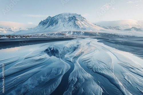 Icelandic snowy mountain reflected in the ocean, AI-generated.