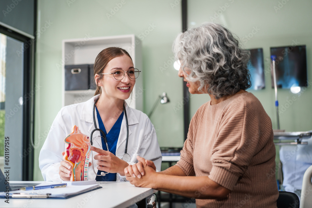 Caucasian woman and elderly Asian woman discuss health issues cold, influenza, pneumonia, bronchitis, stomach disease, GERD, IBS, inflammatory bowel disease, gallstones, chronic constipation
