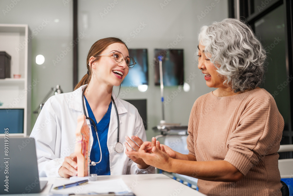 Caucasian woman and elderly Asian woman discuss health issues cold, influenza, pneumonia, bronchitis, stomach disease, GERD, IBS, inflammatory bowel disease, gallstones, chronic constipation