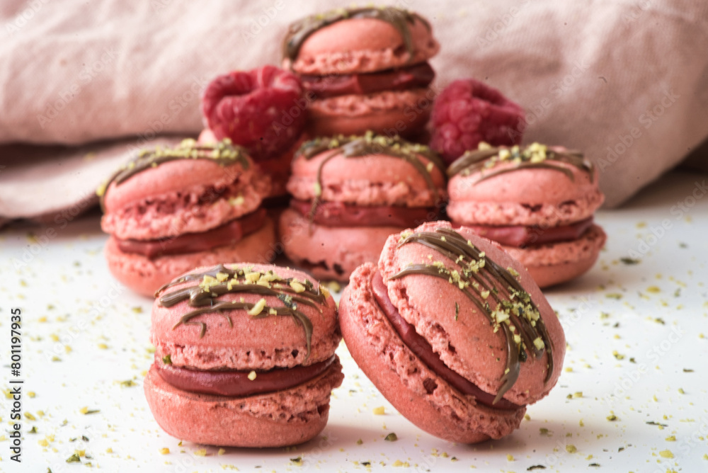 Pink Macarons with Chocolate Drizzle and Pistachios Pink Macarons with Chocolate Drizzle and Pistachios