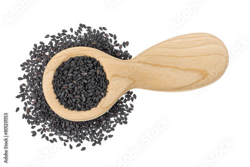 black sesame seeds in wooden spoon isolated on white background. Top view. Flat lay © kolesnikovserg