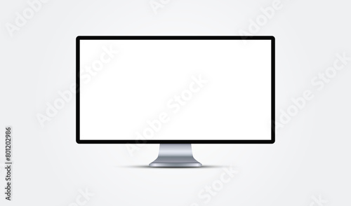 Computer monitor mockup front view with white empty screen for display your ux design, site, presentation and web project. Realistic 3d smart led tv standing on desk with shadow. © SidorArt