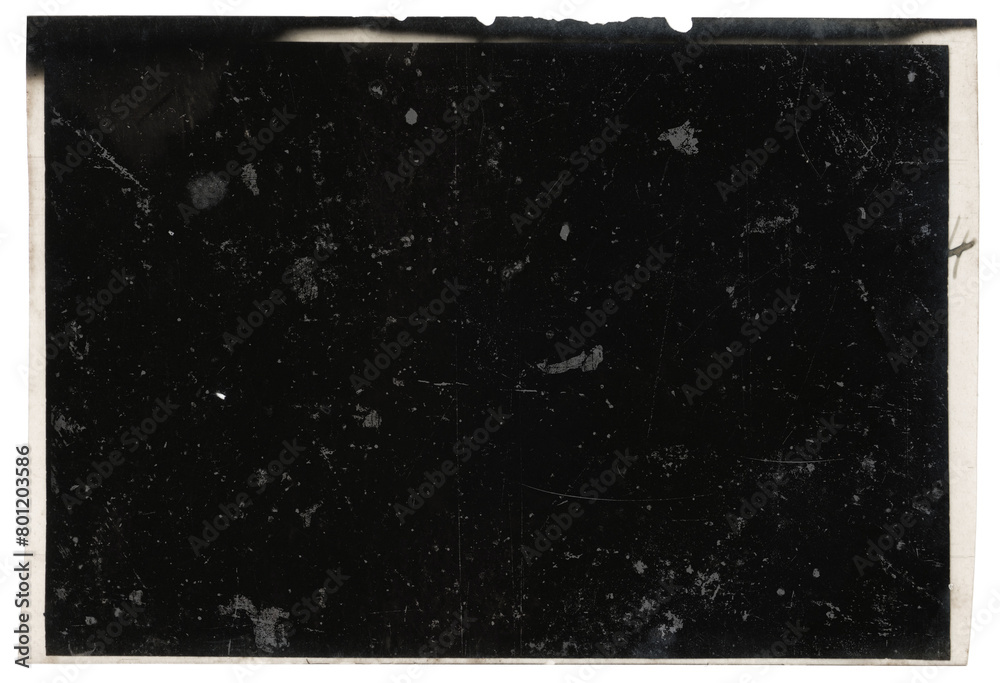 Vintage photo slider, black background with dusts and scratches, with semi-transparent egde of the film on transparent background with space for text.