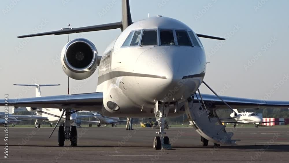 Private Business Corporate Executive Jet Parked with door open at Airport Private Business Corporate Executive Jet Parked with door open at Airport