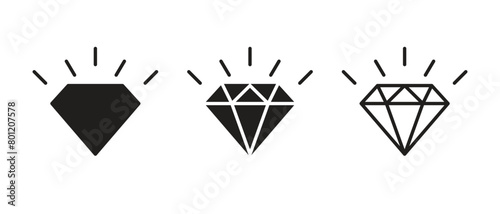 A set of diamond icons, a sparkling gemstone of diamond with rays.
