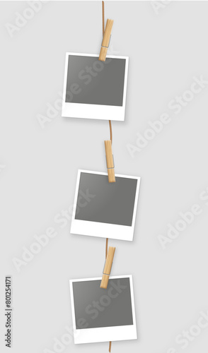 real string polaroids hanging down