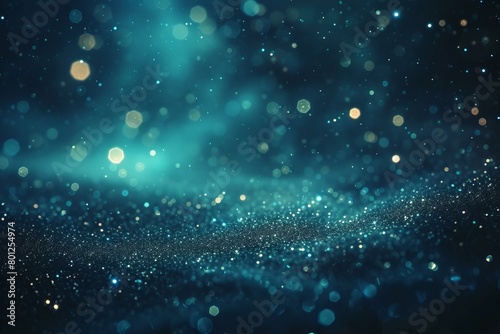 Blue glitter background with glowing particles
