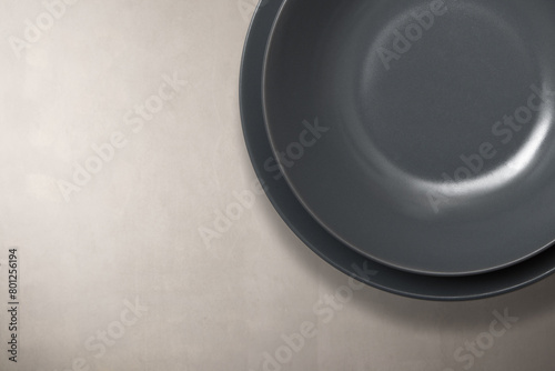 empty grey dish on background