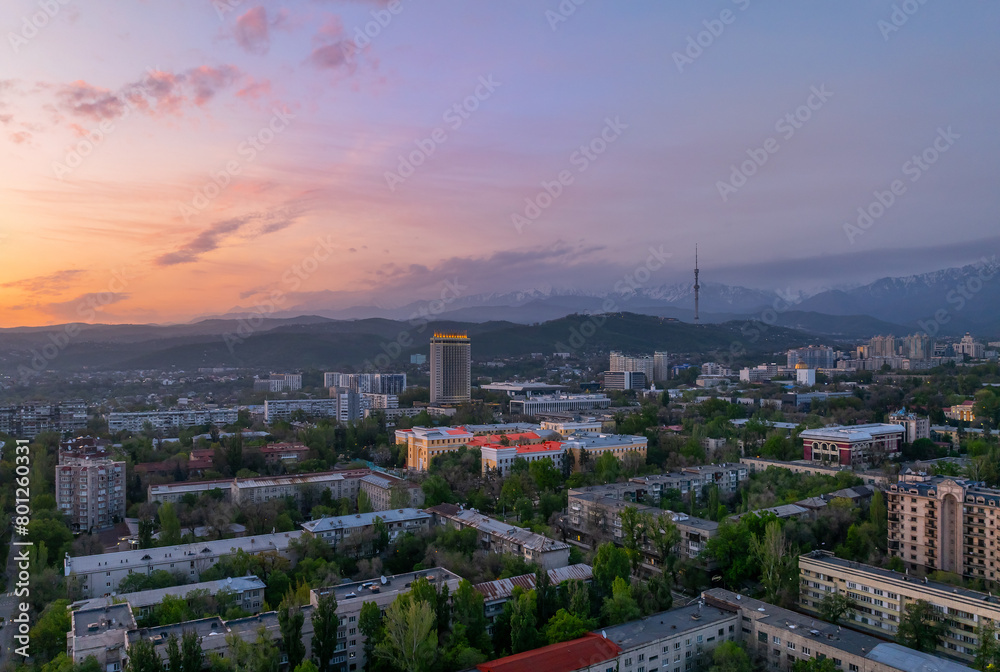 Scenic view from a quadcopter of the largest Kazakh city of Almaty in the early spring morning