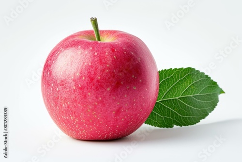 A red apple with a green leaf on a white background