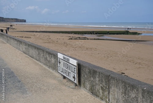 Vierville-sur-Mer, France - Apr 24, 2024: Omaha Beach D-Day. Normandy landings during Second World War. Cloudy spring day. Selective focus. photo