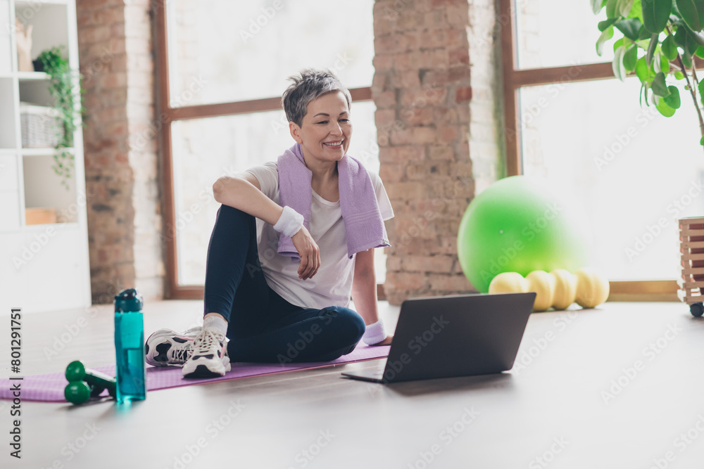 Full size photo of nice retired woman sit mat online training exercises
