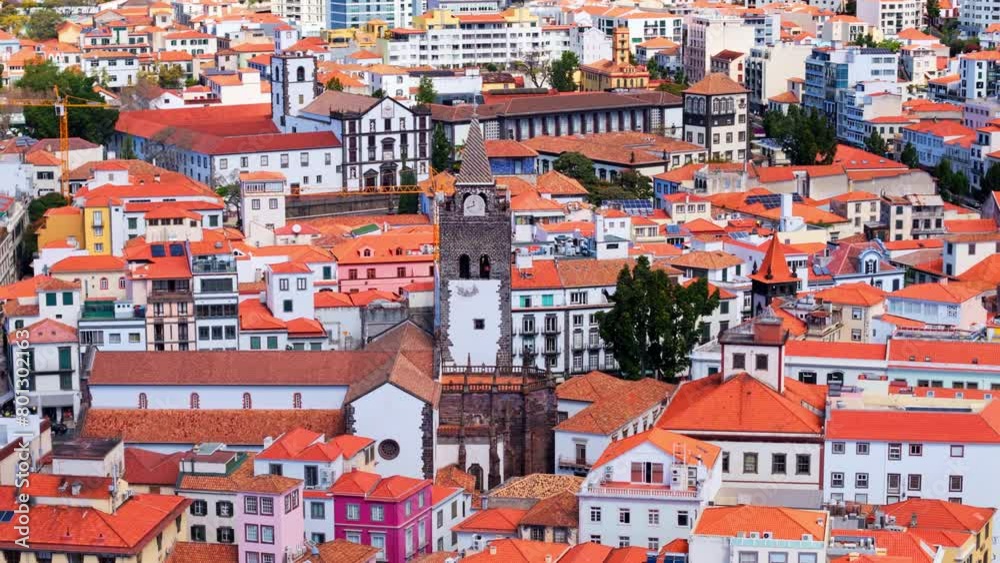 Cathedral of Funchal on Madeira island, cityscape downtown with roofs. Aerial view Cathedral of Funchal on Madeira island, cityscape downtown with roofs. Aerial view
