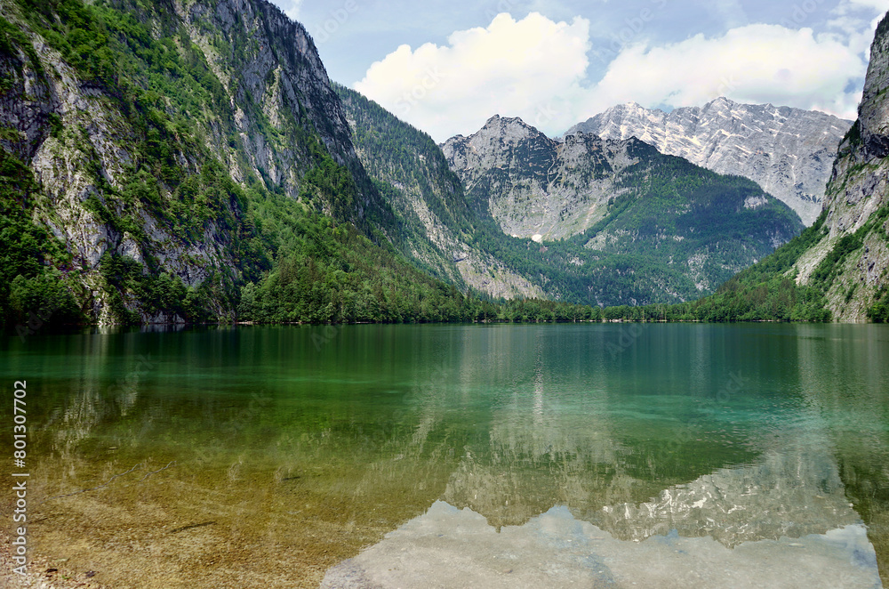 Lake with the color of clear green water at Obersee lake in the Nationalpark Berchtesgaden, Bavaria, Germany.