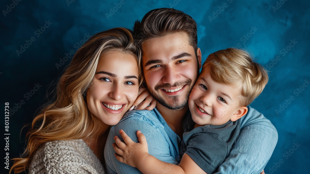 happy family of mom, dad and son of european descent on a dark blue background