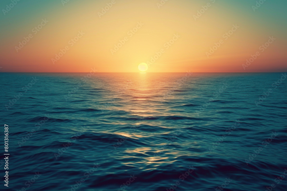 Calming sunset over the ocean horizon, with the sun casting a golden glow across the tranquil sea waters.