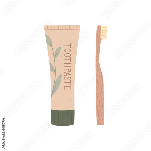 Bamboo toothbrush and natural toothpaste, isolated on white background.