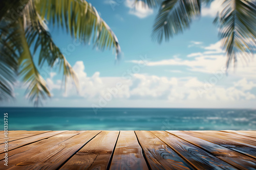 Empty wooden table on blurred tropical sea and sky background