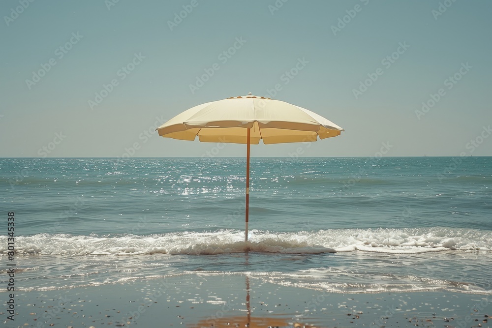 Beach umbrella on the seaside beautiful light and shadows.