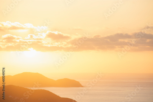 USA, United States Virgin Islands, St. John, Golden sunrise over calm Caribbean Sea photo