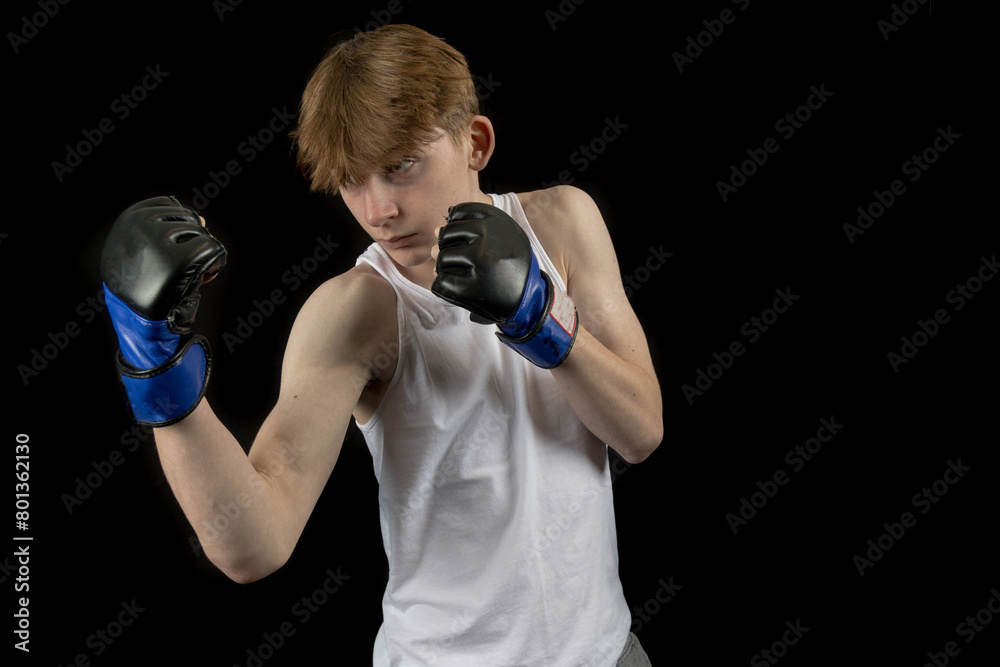 A Teenage Male Boxer and Black Background A Teenage Male Boxer and Black Background