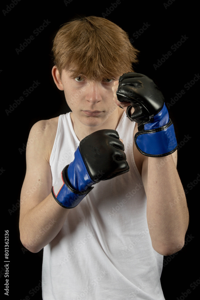 A Teenage Male Boxer and Black Background A Teenage Male Boxer and Black Background