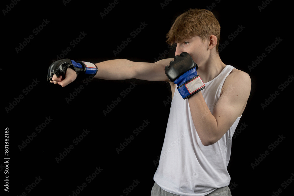 A Teenage Male Boxer and Black Background A Teenage Male Boxer and Black Background