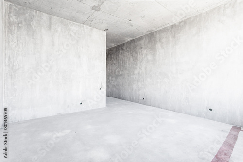 interior of the apartment without decoration in gray colors. rough finish